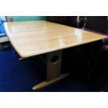 A blond retro style Ercol elm dining table 59.5in