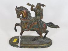 A 19thC. bronze figure of man on horse