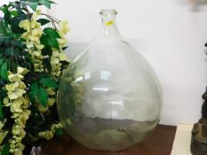 An early 20thC. glass carboy 18in high