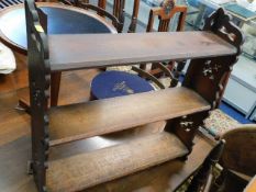 A small oak freestanding shelf unit