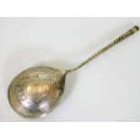 A Russian silver spoon with engraved decor & cyril