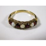 A 9ct gold ring set with opal & garnet 1.9g size O