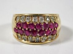 A 9ct gold ring set with diamond & ruby 5.2g size