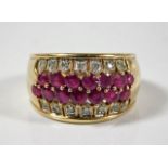 A 9ct gold ring set with diamond & ruby 5.2g size