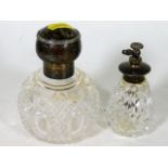 A silver topped scent bottle twinned with silver t