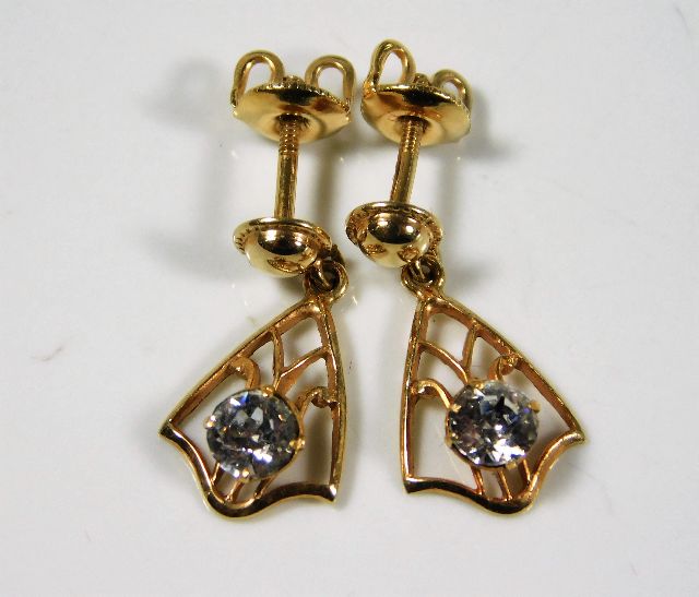 A pair of ladies 9ct gold earrings set with white