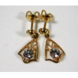 A pair of ladies 9ct gold earrings set with white