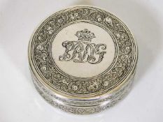 A good quality silver box with engraved decor & in