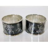 Two Thai silver napkin rings with engraved decor
