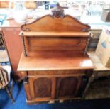 A mahogany veneer chiffonier with barley twist sup