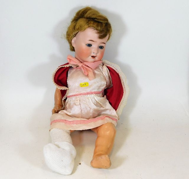 A German porcelain bisque head doll