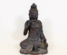 A Chinese cast iron deity 9.25in high x 5.5in wide