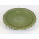 A Chinese Longquan celadon bowl with scalloped edg