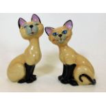 A pair of Wade porcelain Disney Siamese cats