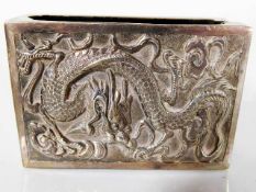 A Chinese silver vesta holder with dragon decor bo