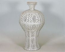 A Chinese Dehua lattice work porcelain blanc de ch