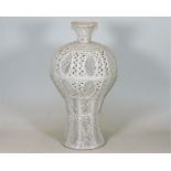 A Chinese Dehua lattice work porcelain blanc de ch