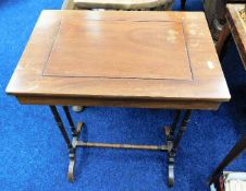 An Edwardian table with secret storage top
