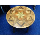 An arts & crafts style inlaid table