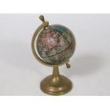 A small brass mounted globe