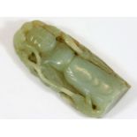 A Chinese carved hardstone amulet 2.75in x 1.25in,