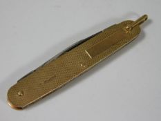 A 9ct gold cased pocket knife 18.4g inclusive
