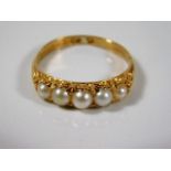 An 18ct Victorian ring set with natural pearl 3.9g