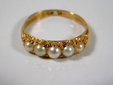 An 18ct Victorian ring set with natural pearl 3.9g