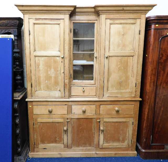 A substantial 19thC. pine dresser with recessed do