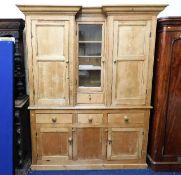 A substantial 19thC. pine dresser with recessed do