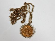 A 1913 full gold sovereign with 9ct gold chain 16.