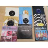 Two boxes of popular music vinyl singles