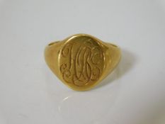 An 18ct gold signet ring, inscribed 6.7g