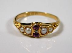 An 18ct gold ring with datemark for 1901, set with
