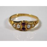 An 18ct gold ring with datemark for 1901, set with