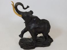 A detailed bronze model of an elephant