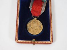 A boxed 1956 medal awarded by President of Portuga