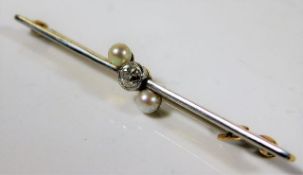 A yellow & white metal bar brooch tests at 18ct set with diamond & natural pearl 3.6g