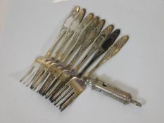 A set of eight plated pastry forks marked A & Co.