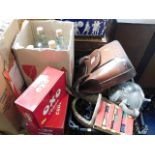 A leather case, four wine bottles, three Oxo tins,