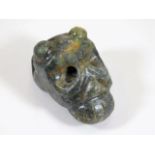A Chinese ceremonial carved hardstone monkey skull