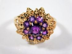 A 9ct gold gypsy style ring with amethyst 4.3g siz