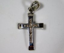 A 9ct white gold & diamond cross pendant