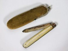 A silver bladed fruit knife with pouch