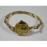 A ladies vintage watch with 9ct gold case & a plat