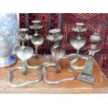 Four brass Indian cobra candlesticks & a brass fig