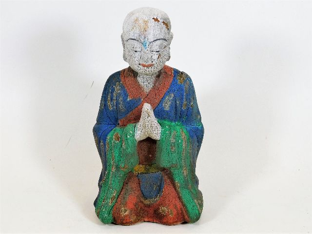 A Chinese carved wooden polychrome figure Buddha f