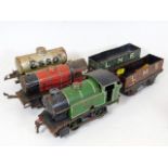 A Hornby tinplate clockwork engine, one other & th