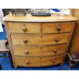 A Victorian bow fronted chest of drawers, some fau