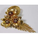 An impressive & substantial 18ct gold brooch of fl